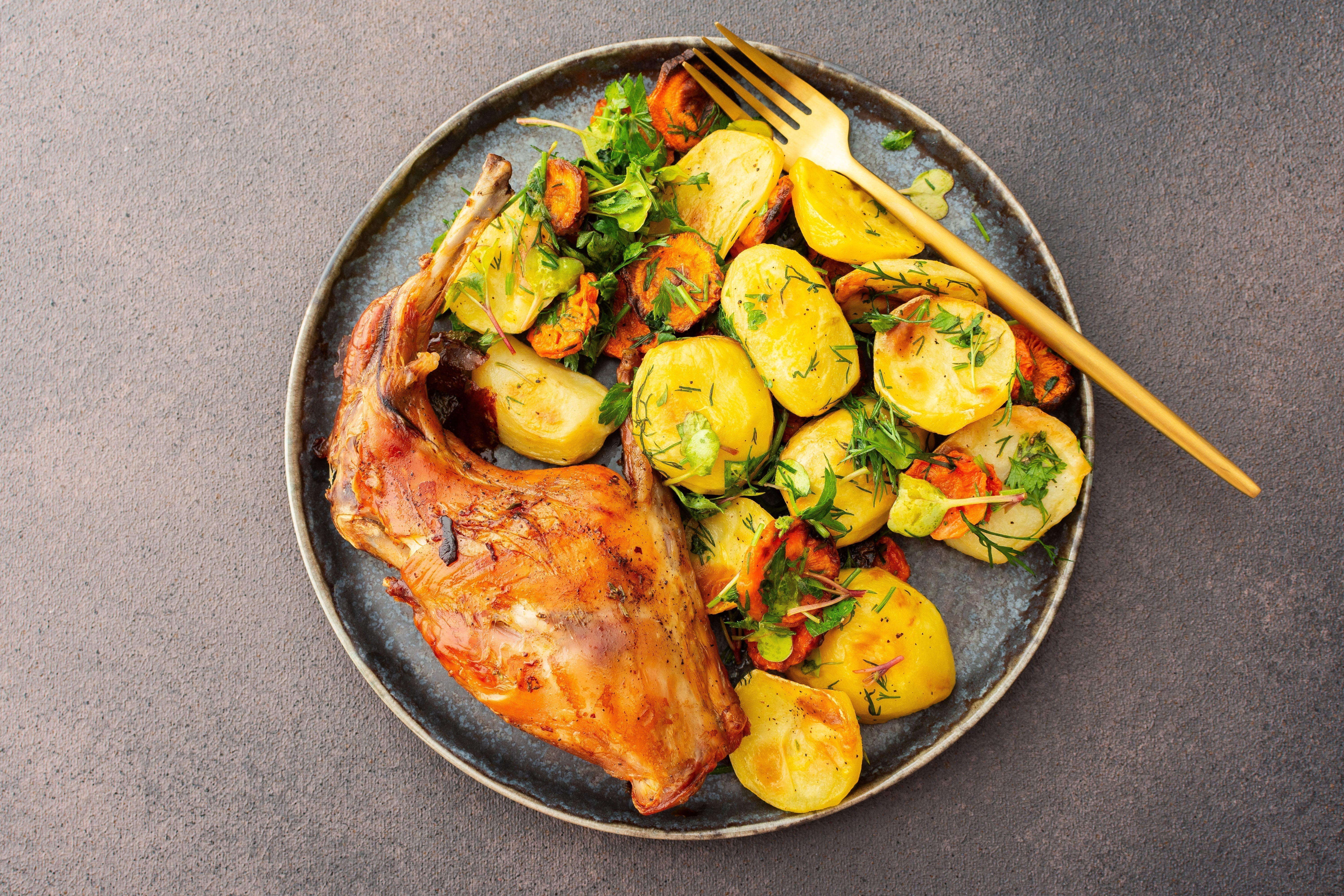 Baked Rabbit Legs with Carrots and Potatoes